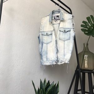 Distressed denim vest